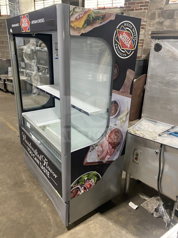 Ojeda ALPA120H refrigerated merchandiser with night curtain, multi-tier open design, 120V 1 Phase, featuring Dietz & Watson branding.