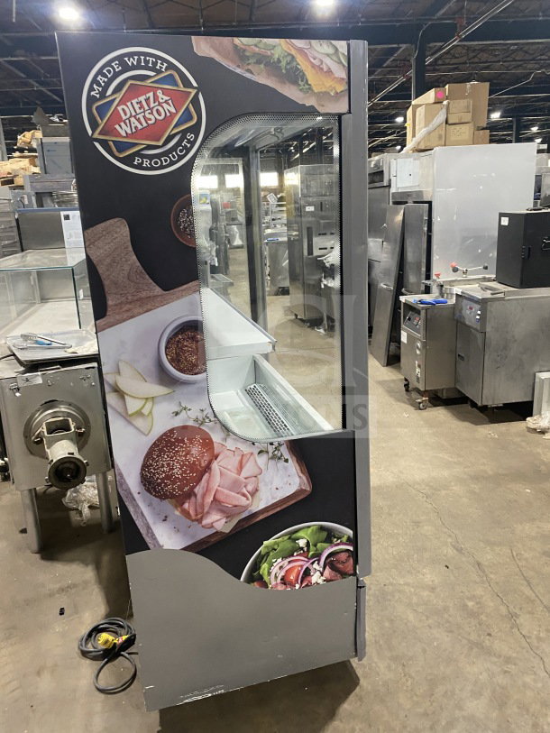 Ojeda ALPA-120H refrigerated display case, multi-tier, white, pull-down night curtain, Dietz & Watson branding visible.