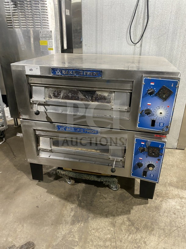 Bakers Pride stainless steel double deck pizza oven on casters and legs. Electric powered, visible control panel, commercial use.