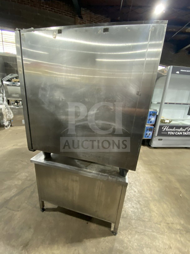 Rational White Efficiency Series natural gas combi convection oven with two-section pan-holding base and wired rack, on legs.