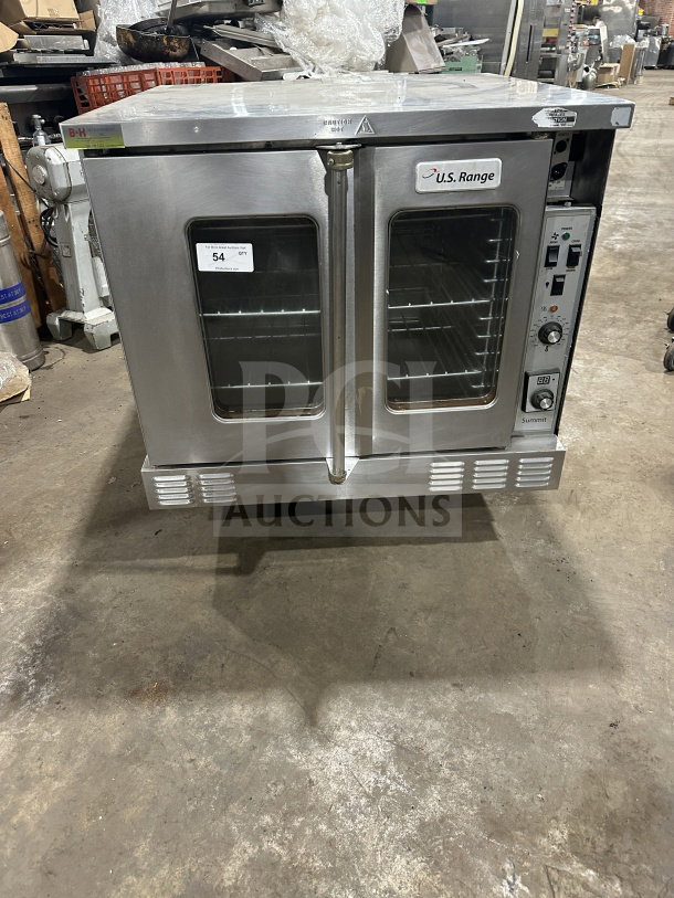USRange stainless steel gas convection oven with simple controls, wired rack, and dual glass doors. Good condition, tag 54.