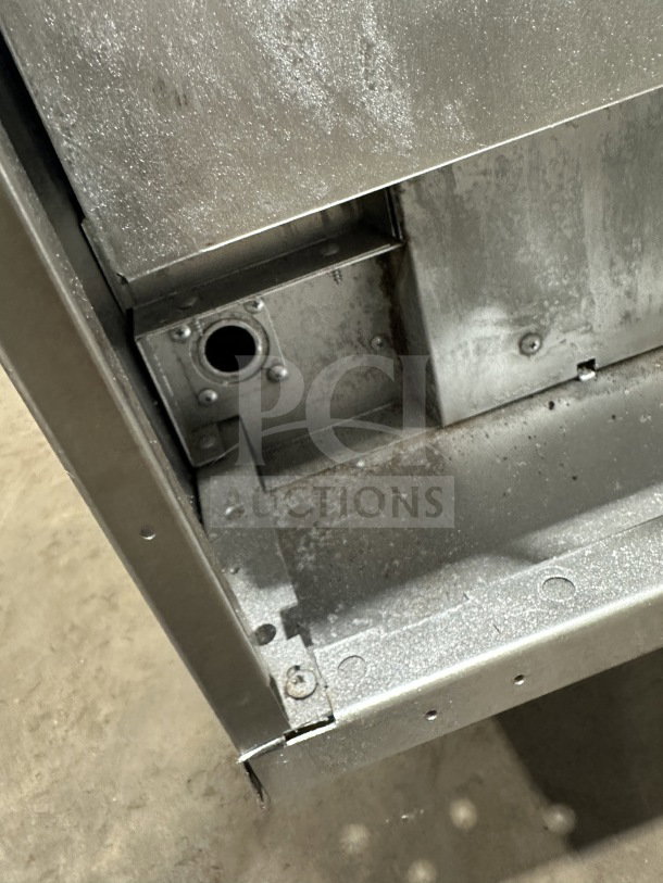 US Range commercial stainless steel convection oven corner detail showing sturdy construction. Includes simple control and wired rack.