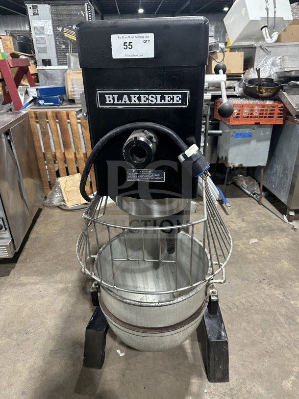 Blakeslee commercial black planetary mixer with stainless steel bowl, bowl guard, spiral hook attachment, and legs; excellent condition.