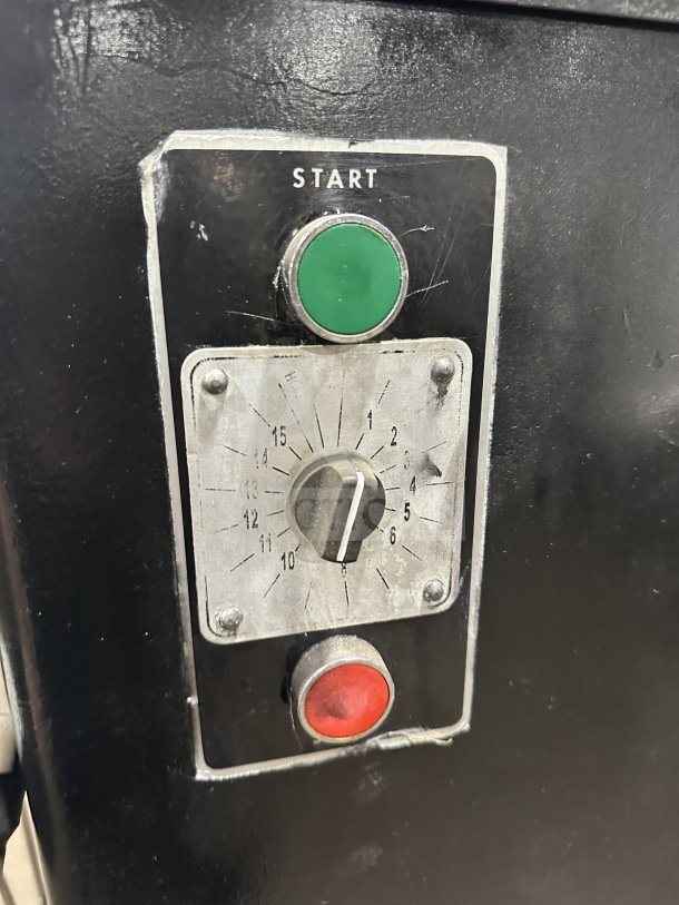 Blakeslee Commercial Black Heavy-Duty Planetary Mixer control panel with start button and timer dial.