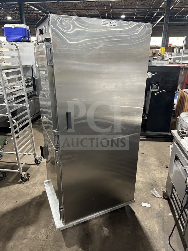 CresCor H137SUA12C stainless steel 2-door heated holding cabinet on casters, for auction. Model: H137SUA12C, 120/125V, 1 phase.