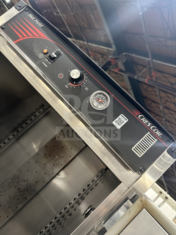 CresCor H137SUA12C stainless steel heated holding cabinet, 2 solid doors, on casters, 120/125V, control panel visible.