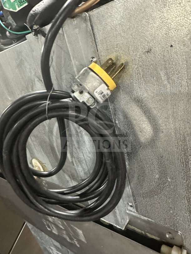 Hoshizaki CR1SFSL commercial stainless steel refrigerator power cord and plug, 115V, 1 phase, on casters, poly-coated rack.