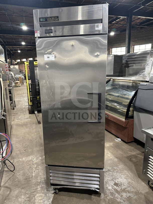 True T23FHC commercial stainless steel single door freezer on casters. Features poly coated wired rack. Model: T23FHC, SN: 8715275.