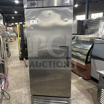 True T23FHC commercial stainless steel single door freezer on casters. Features poly coated wired rack. Model: T23FHC, SN: 8715275.