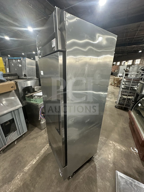 True T23FHC stainless steel commercial reach-in freezer, single solid door, poly-coated rack, on casters, 115V, 1 phase.