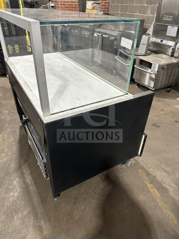 Structural Concepts model SB25452DR black refrigerated open grab-n-go display case with glass top and rear sliding doors.