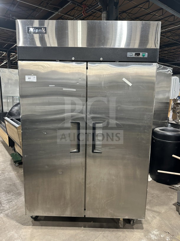 Migali T-Series 2-door stainless steel commercial freezer, Model C27, on casters with poly-coated rack, 115V, serial C-2F00317052500920018.