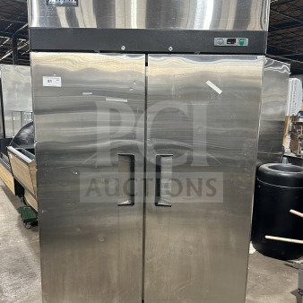 Migali T-Series 2-door stainless steel commercial freezer, Model C27, on casters with poly-coated rack, 115V, serial C-2F00317052500920018.