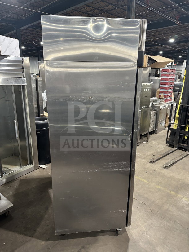 Migali T-Series C-2F stainless steel 2-door vertical freezer, with poly coated wired rack, on casters, 115V 1 Phase.
