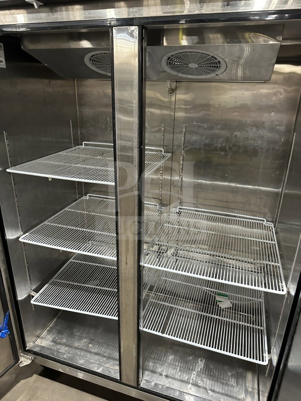 Migali T-Series 2-Door stainless steel freezer, model C-2F, with poly coated racks, casters, 115V, serial C-2F00317052500920018.