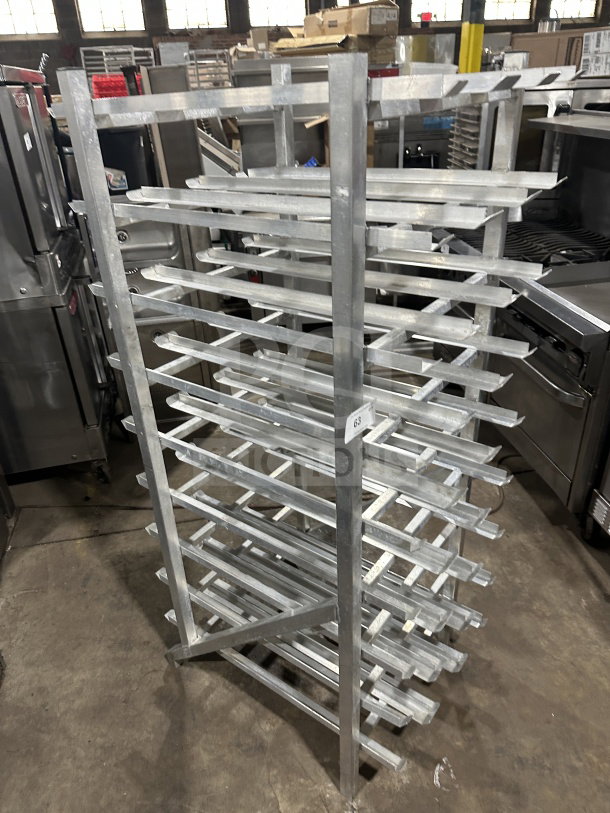 WinHolt CR-162 stainless steel full-size can storage rack in good condition, featuring multiple slots for organized storage.