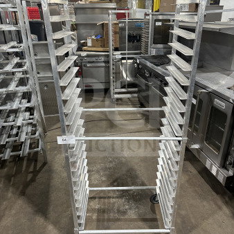 Regency stainless steel heavy-duty bun pan rack, 20-slot, commercial use, excellent condition, caster wheels, item 64 visible.