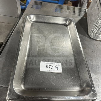 Commercial heavy-duty stainless steel anti-jam full-size hotel steam table food pan in good condition, auction label visible.
