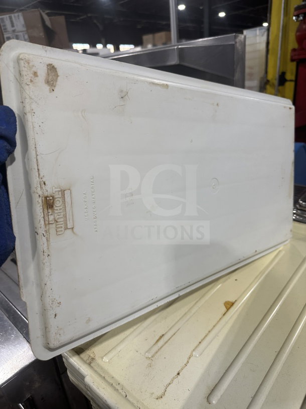 Win-Holt heavy-duty white polyethylene meat lug cover lid, features visible wear and a Win-Holt logo and approval marking.