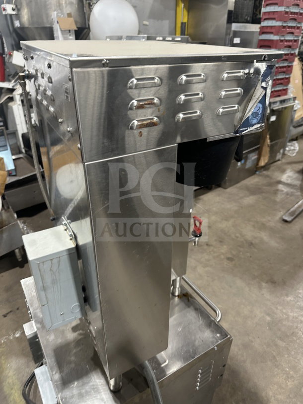 Curtis ThermoPro Series TP2T16A3100 stainless steel twin coffee brewer with digital control, hot water dispenser, and brew baskets.