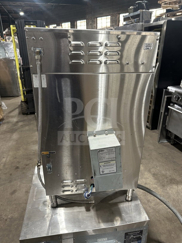 Curtis ThermoPro TP2T16A3100 stainless steel twin coffee brewer, digital controls, hot water dispenser, 220V, 3 phase, on legs.