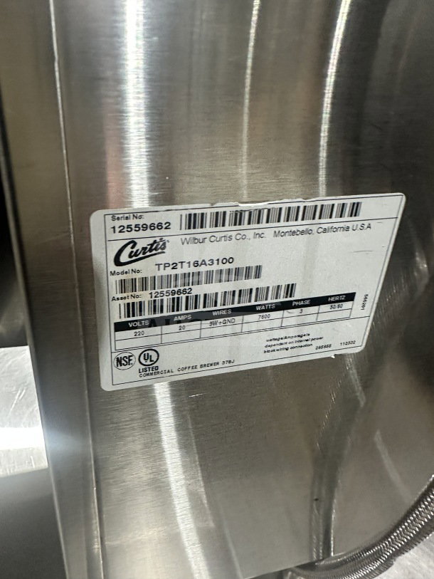 Curtis ThermoPro TP2T16A3100 commercial coffee brewer label; stainless steel, 220V, serial #12559662, NSF/UL listed.