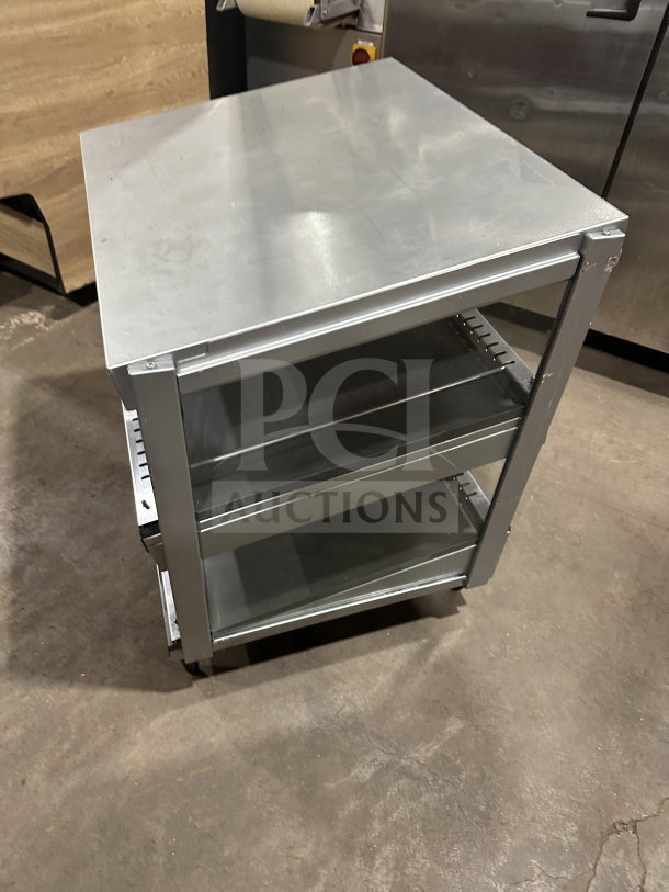 Hatco 30" stainless steel electric slanted double shelf merchandiser warmer, Model GRSDS-30D, in good condition.