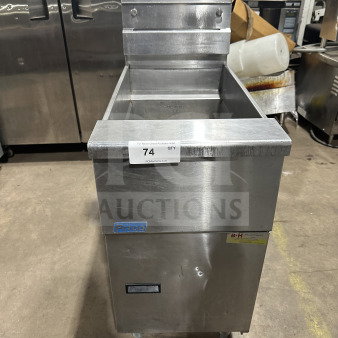Pitco SG14 gas fryer, 40 lb capacity, stainless steel, with backsplash and legs. Serial: G16AD001098. Good condition.