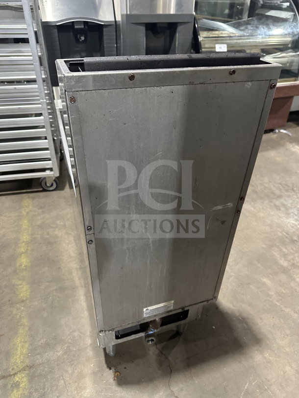 Pitco SG14 commercial stainless steel gas fryer, 40 lb capacity, with backsplash, on legs. Model SG14, SN: G16AD001098.