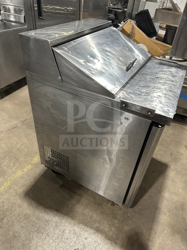 Turbo Air M3 Series MST-28 refrigerated prep table, stainless steel, single door, on casters, poly-coated rack, 115V.