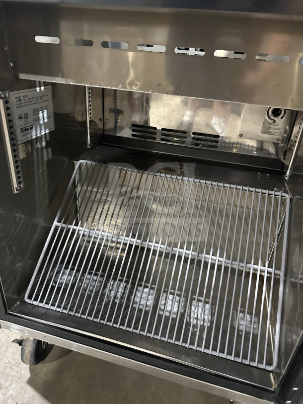 Turbo Air M3 Series stainless steel refrigerated prep table, model MST-28, with poly coated wire rack and casters, 115V.