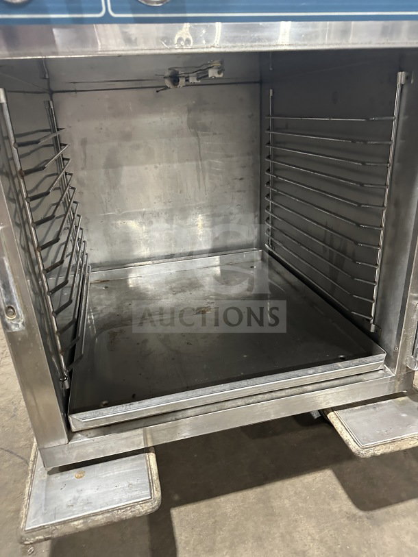 Alto-Shaam Halo Heat Series 750-S stainless steel holding cabinet, interior view, shelves intact, good condition.
