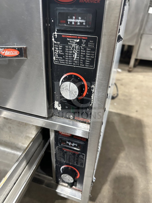 Hatco stainless steel 2-drawer warmer, model HDW2W, SN: 8167612116, with temperature controls and recommended settings label.