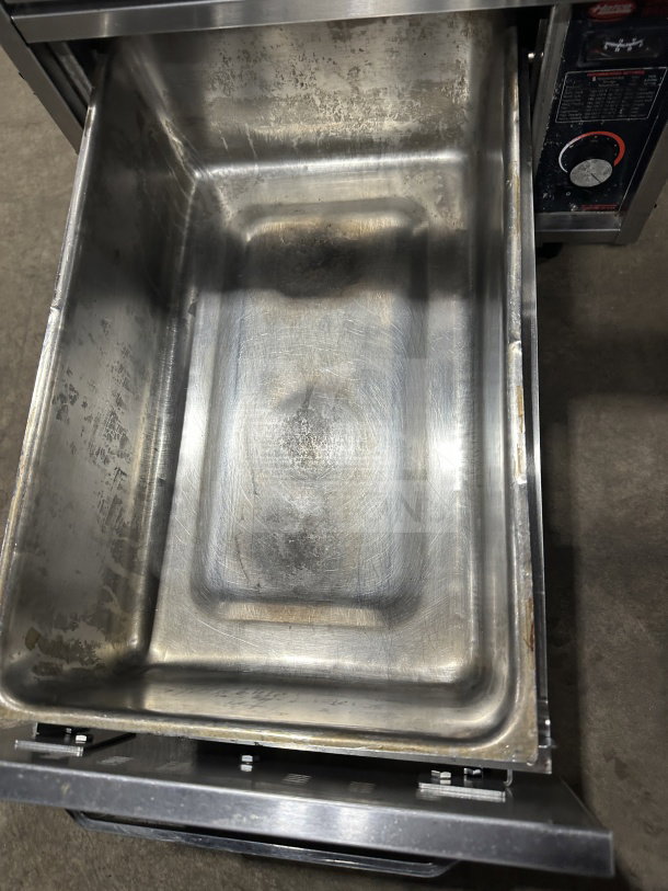 Hatco HDW2W stainless steel 2-drawer warmer on legs, electric 120V, SN: 8167612116, countertop model, used condition.