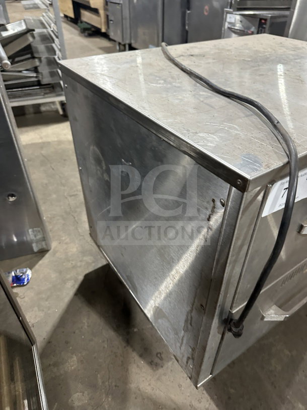 Eagle Group RedHots Series stainless steel double warming drawer, model DWW-2-120, on casters, visible wear, 120V, 1 phase.