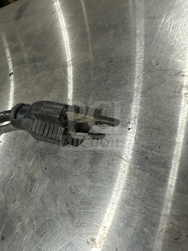 Black power plug for Eagle Group RedHots Series DWW-2-120 electric warming drawer, showing wear.
