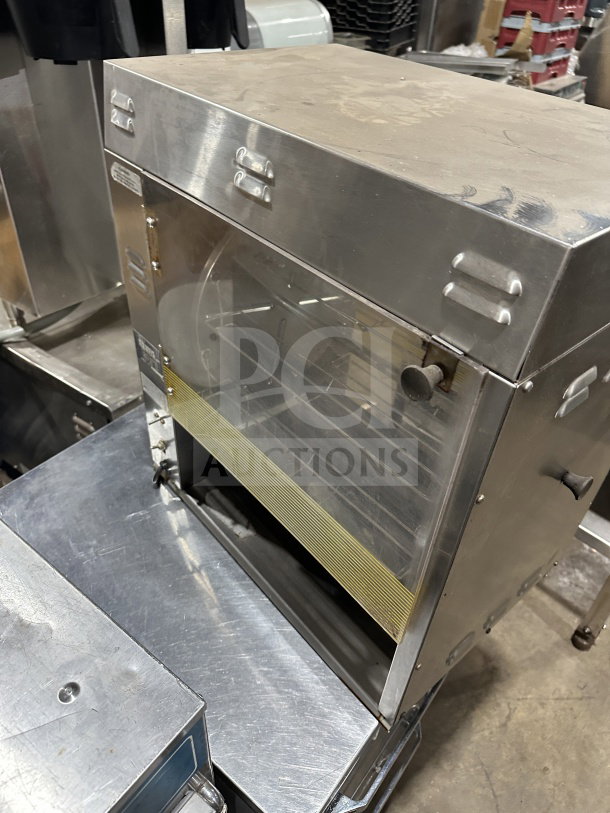 Prince Castle Model 413 commercial stainless steel corn carousel. Electric powered, used condition, SN: 102, 115V.