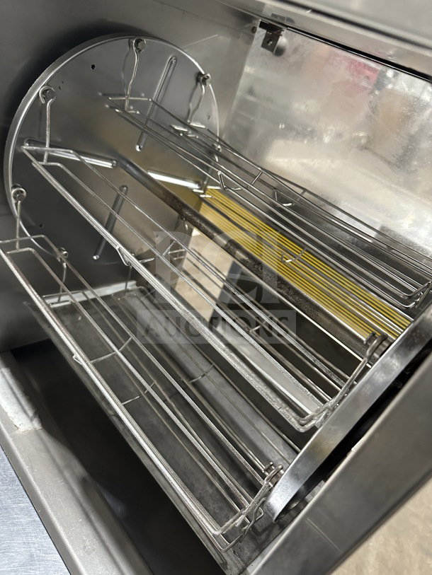 Prince Castle Model 413 commercial stainless steel corn carousel, electric-powered, model SN: 102, 115V, in used condition.