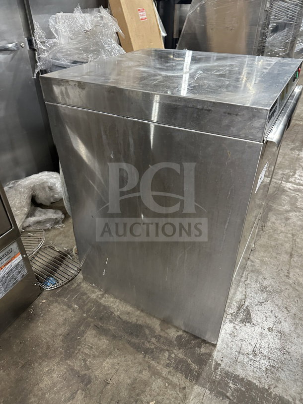 Champion UH130BM4 stainless steel undercounter dishwasher; electric, high-temp, used condition. Model SN: W180275562.