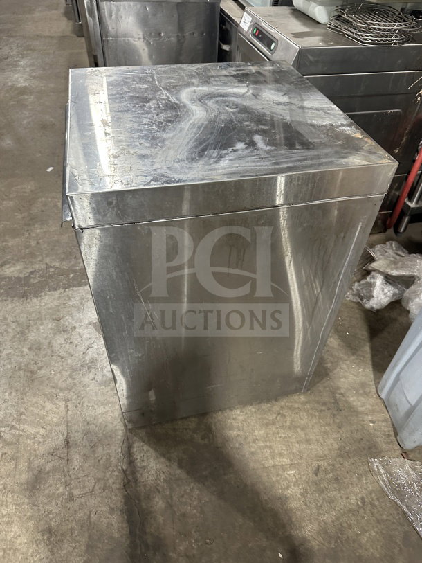 Champion UH130BM4 stainless steel undercounter dishwasher, commercial model, high-temperature, used condition.