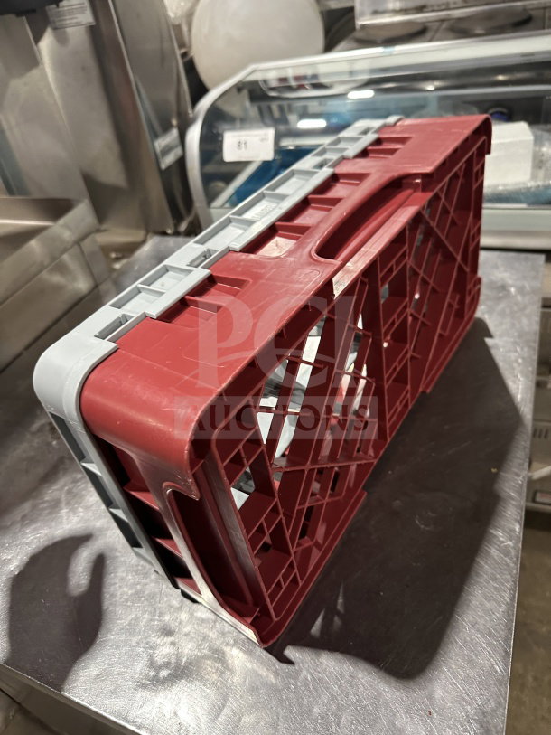 Commercial Cranberry Camrack with 10 compartments and 1 extender, half-size, 3 5/8" height, used for glass storage.