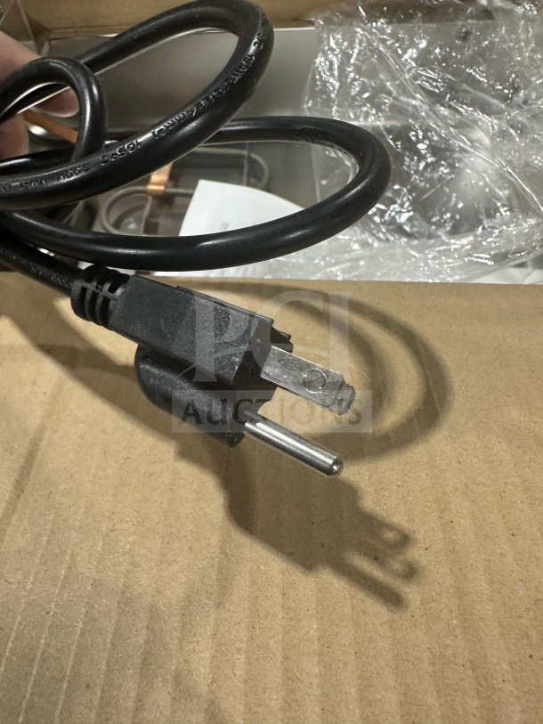 Continental Refrigeration stainless steel evaporator pan, Model F412502, new in box, includes 120V power cord.