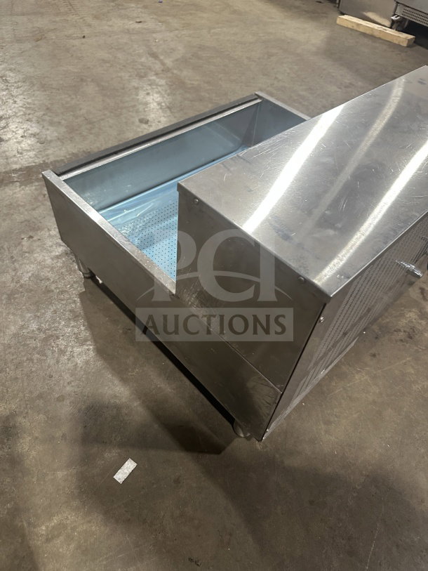 Carter Hoffmann CNH28 stainless steel fry warming station, countertop model with legs, 208V, visible slight wear.