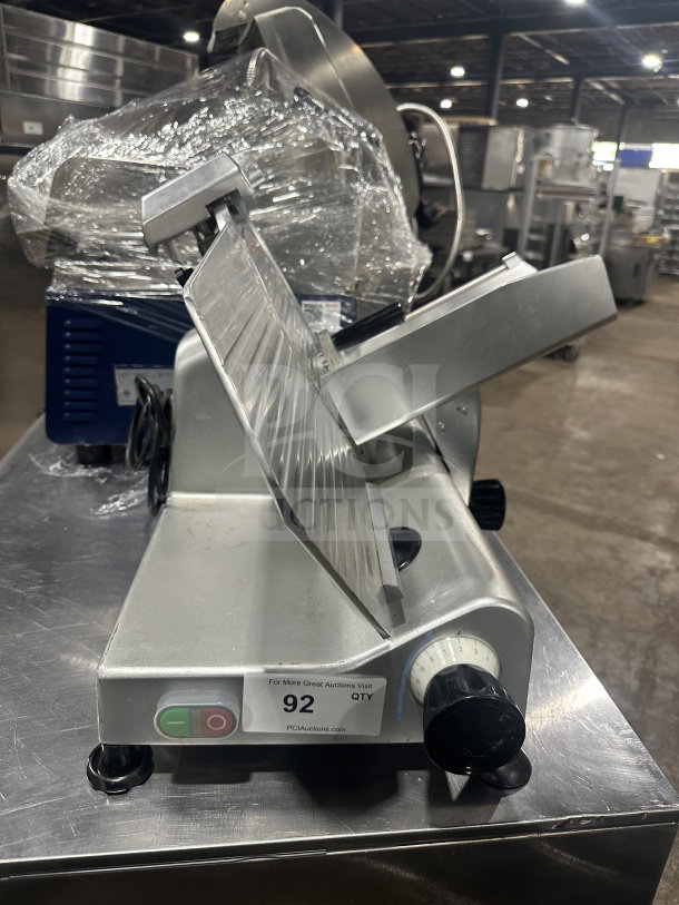 Avantco Commercial Stainless Steel 12" Semi-Automatic Deli Slicer, Model 300ES12, on legs, features power dial and label.