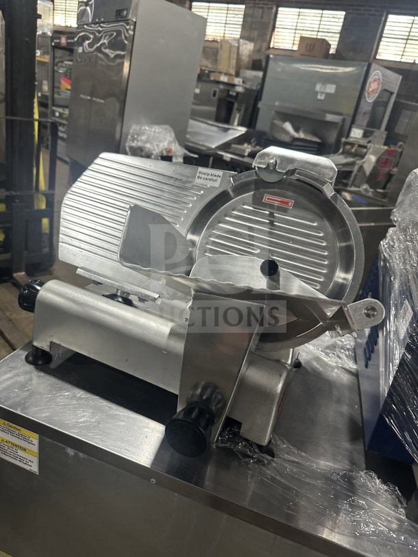 Avantco 300ES12 stainless steel countertop deli slicer, semi-automatic, 12-inch blade, excellent condition, 110/120V.