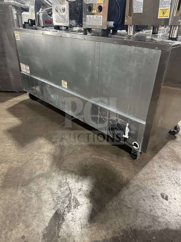 Beverage-Air UCR72AHC commercial stainless steel 3-door undercounter refrigerator, 72", with poly coated wired rack, on casters.