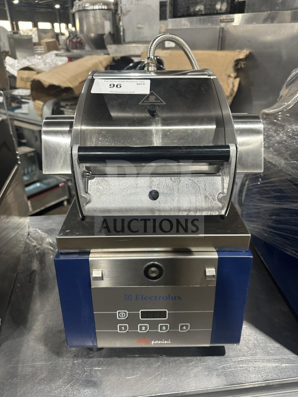 Electrolux 2016 commercial stainless steel panini press, model HSPPA1, electric 208V, countertop design, on legs.