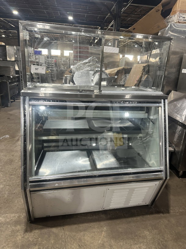 Leader stainless steel dual-service deli case with sliding rear glass doors and ambient top counter. Used condition.
