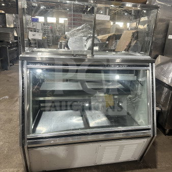 Leader stainless steel dual-service deli case with sliding rear glass doors and ambient top counter. Used condition.