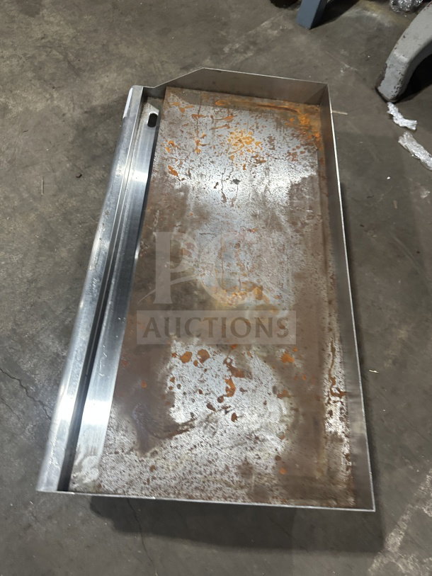 Avantco 177EG36N commercial stainless steel 36" griddle with thermostatic controls, back and side splash, shown in used condition.